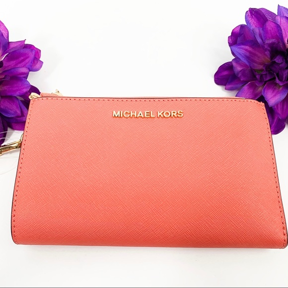Michael Kors Handbags - NWT Michael Kors Double Zip Wrislet